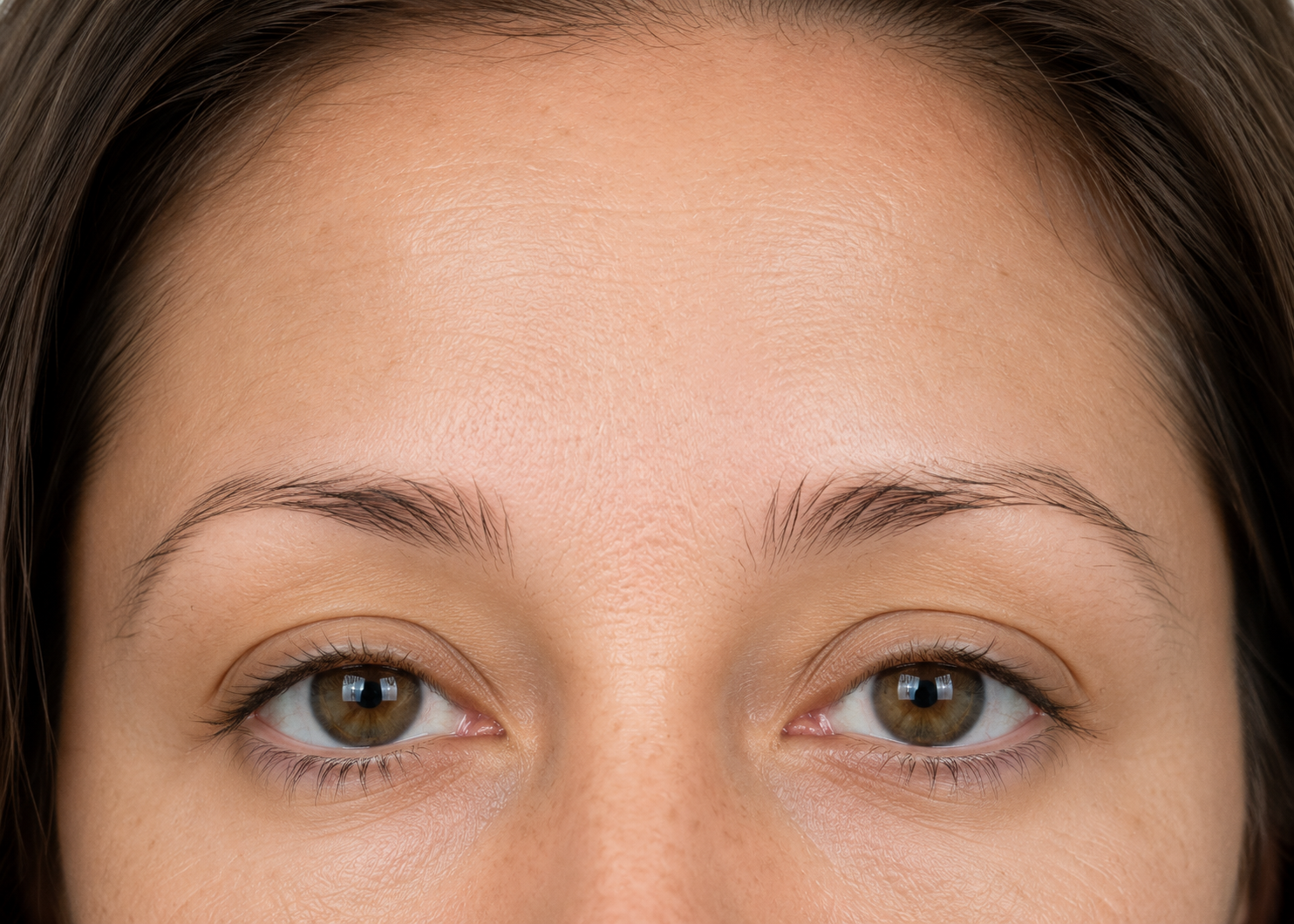 Before: Brow design — natural, unshaped brows